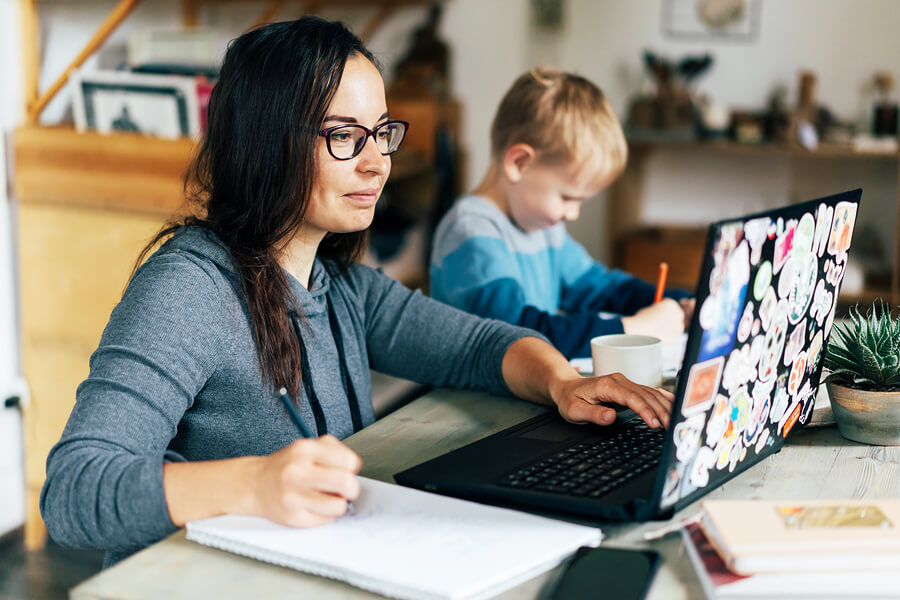 a woman looks for job on the computer