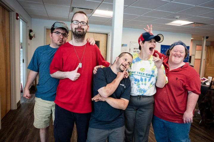 A group of participants in Goodwill's Deaf Services socialize and have fun