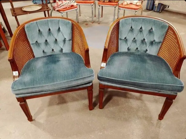 Two beautiful blue vintage chairs with wicker sides