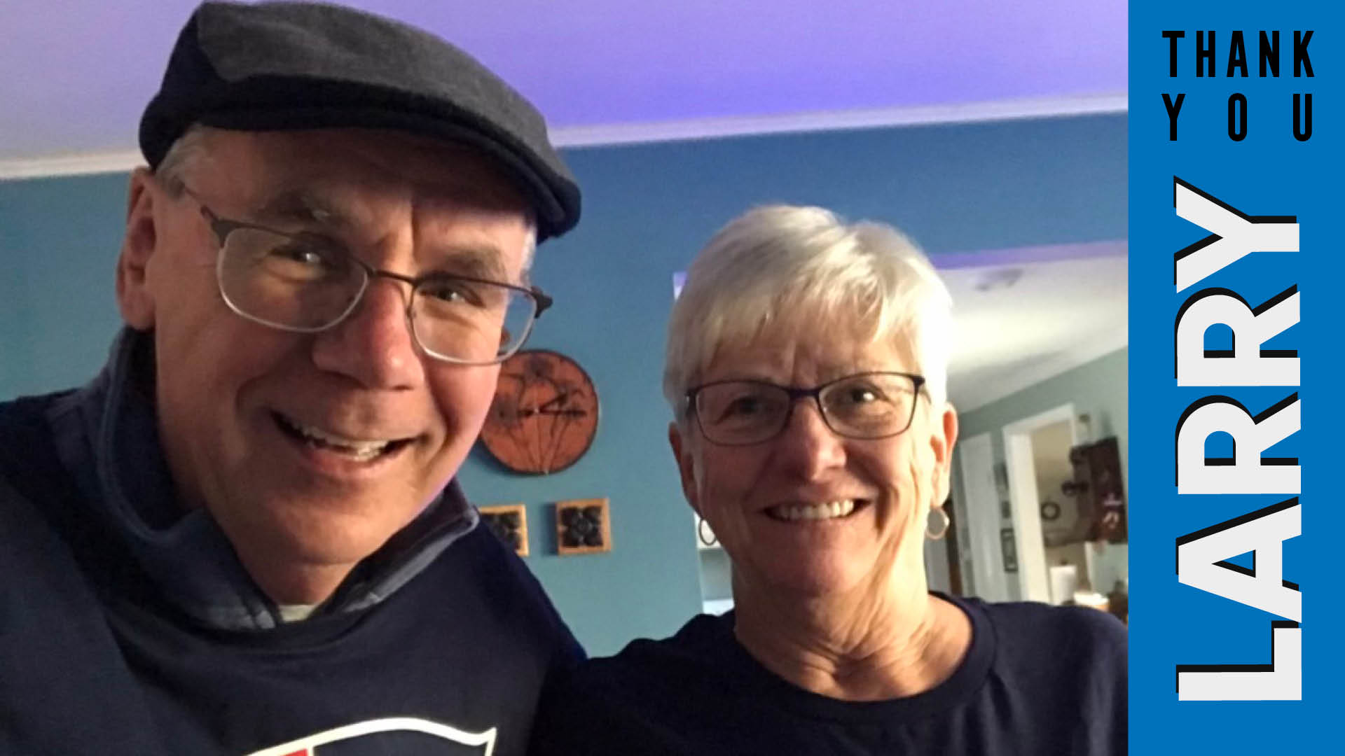 Larry and his wife Ann smiling at the camera.