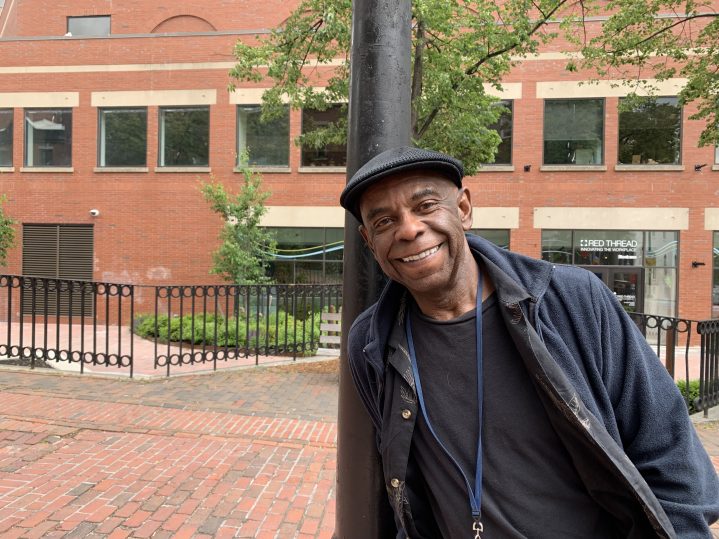 Ken Hull, from Workforce Solutions, stands outside wearing a cap and a smile.