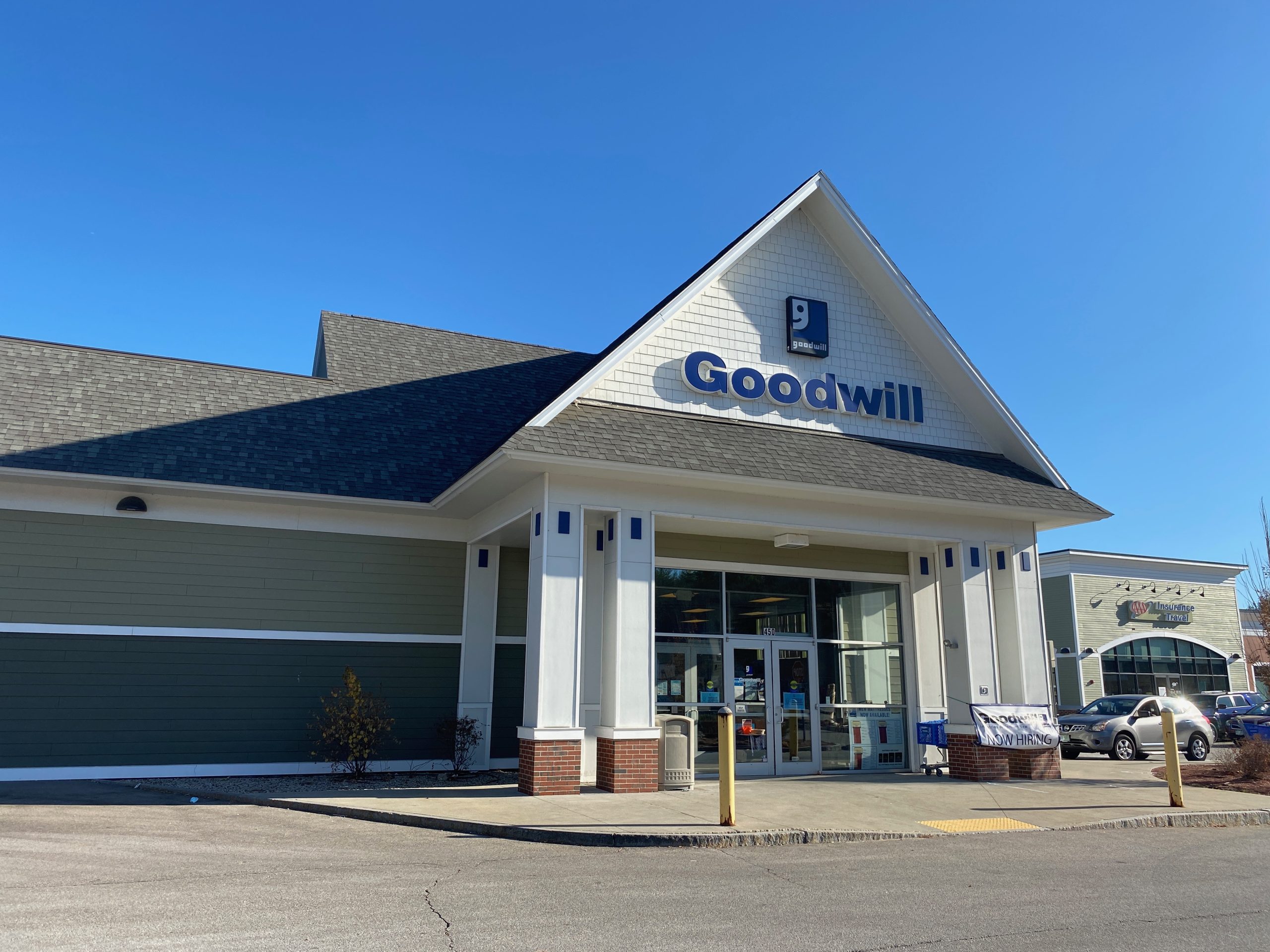 A sunny exterior of a Goodwill store