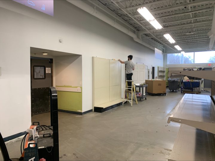 The South Burlington, Vermont store during its remodel. Someone is setting up shelving.