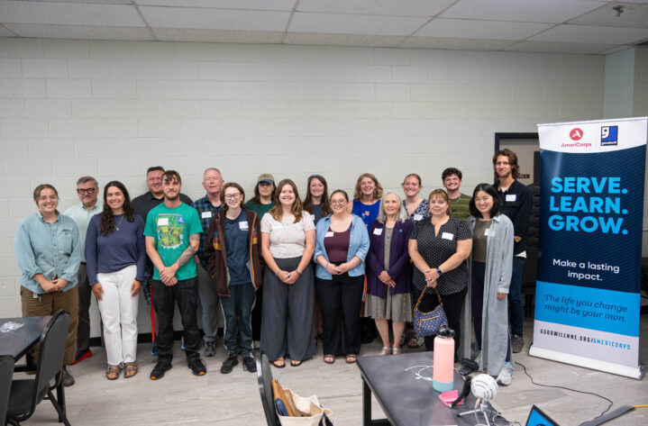 AmeriCorps members pose for a photo at the recognition event